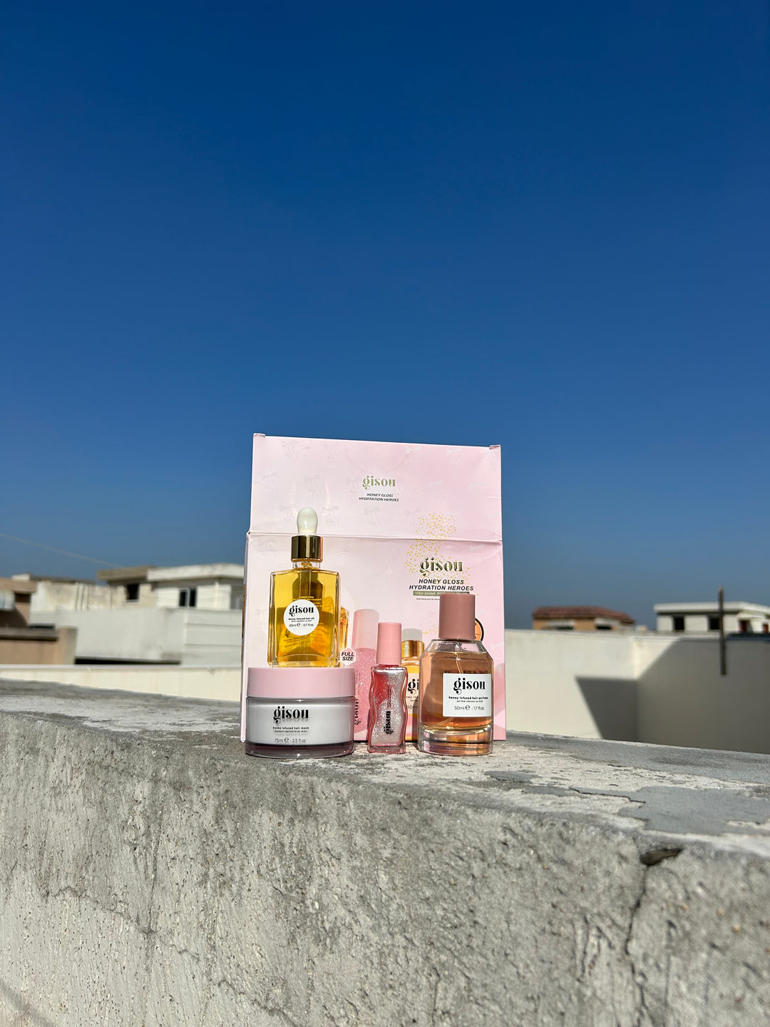 GISOU HONEY GLOSS HYDRATION HEROES SET 4 IN 1 FOR HAIR AND LIPS.